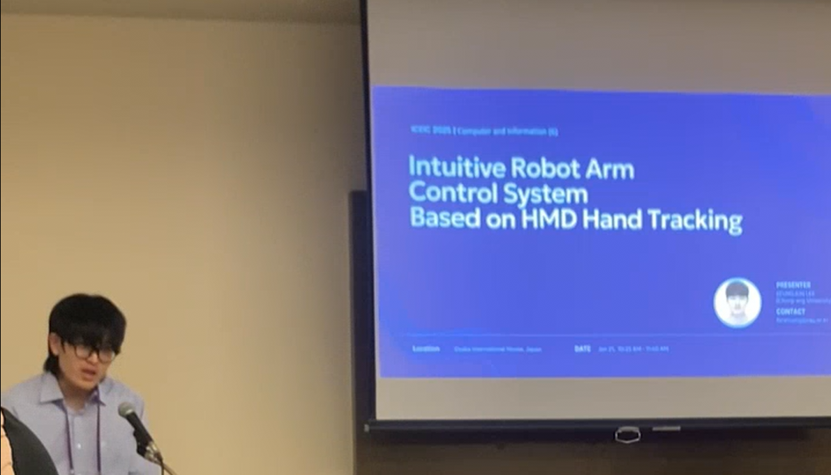 SeungJun Lee presenting the HMD robot arm control system at ICEIC 2025